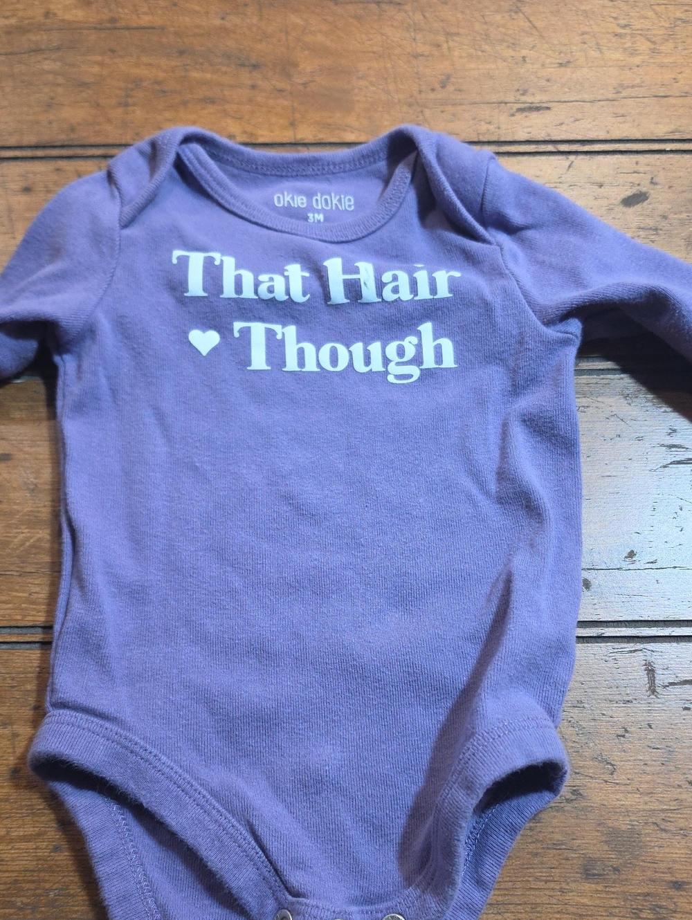 okie dokie Lavender Long Sleeve Bodysuit with White 'That Hair Though' Print